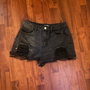 Fashion Nova Black Distressed Denim Shorts with Fishnet Hem